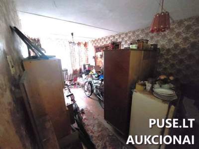 59/100 dalis buto Panevėžio rajone, Liūdynės kaime, Ramioji g. 10, pradinė kaina 2430 EUR