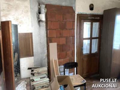 1/2 dalis gyvenamojo namo Vilniaus r. Grigaičių k. Geležinkelio g. 24 su 0.19 ha sklypu už 26700 EUR