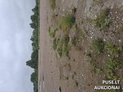 Valstybinis žemės sklypas Skuodo r. sav., Puodkalių k., Skuodo g. 15, pradinė kaina 13550 EUR