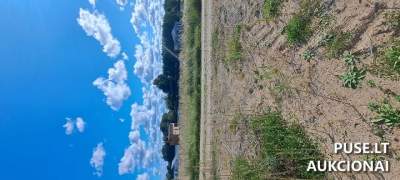Parduodamas žemės sklypas Kauno r. sav., Pajiesio k., Domantų g. 21, 1301/4199 dalis, pradinė kaina 13560 EUR