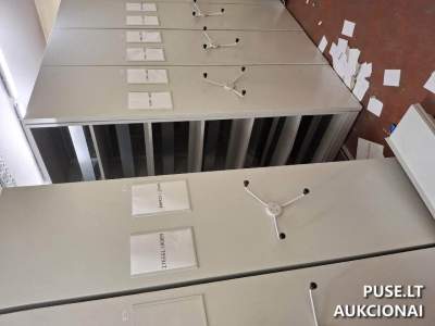 10 komplektų mobilių archyvinių stelažų aukcionas Kaune pradedant nuo 600 EUR