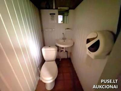 Административное здание с гаражами и участком 0.1050 га в Пасвалисе, ул. Биржу, 20. Начальная цена 104000 EUR