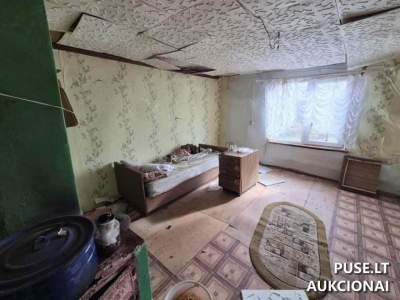 Dalinė gyvenamojo namo nuosavybė Rietave, Dariaus ir Girėno g. 18, pradinė kaina 3540 EUR