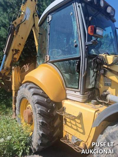 Трактор NEW HOLLAND LB 115 (держ. номер 2566LE) за 9830 EUR у Тракайському районі